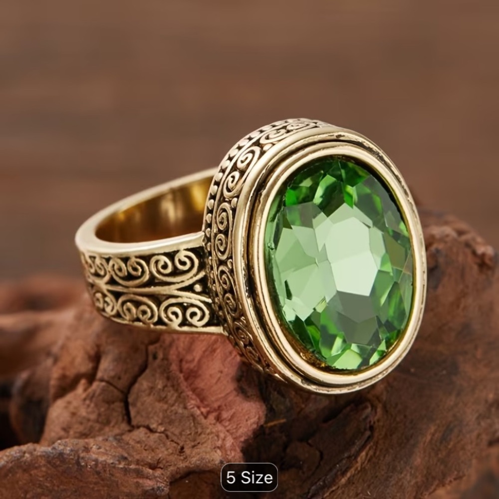 Ornate Scrollwork Gold-Tone Ring with Large Green Oval Synthetic Cubic Zirconia